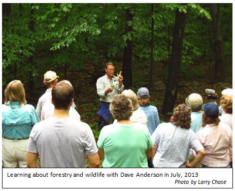 Learning about the forestry and wildlife with Dave Anderson in July, 2013
