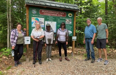 Members of the Moultonborough Conservation Commission visit Moultonborough Falls Conservation Area with the Taking Action for Wildlife team.