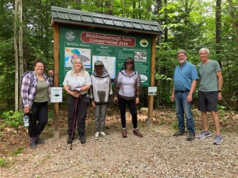 Members of the Moultonborough Conservation Commission visit Moultonborough Falls Conservation Area with the Taking Action for Wildlife team.